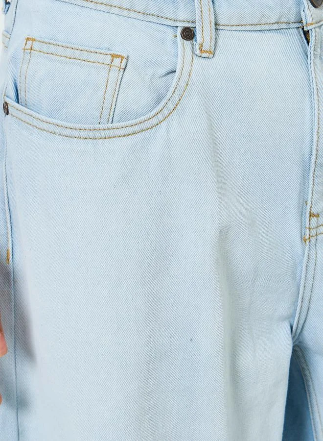 ستايلي جينز رجالي واسع بخصر متوسط وتأثير باهت